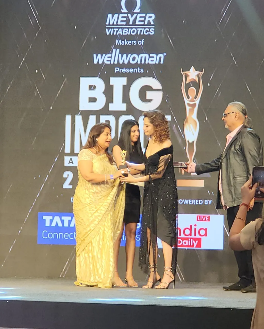 Dr. Nandita Palshetkar receiving the BIG Impact Award 2024